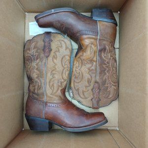 The Sevana Tan 12" tall Women's cowboy boot features a golden brown exterior